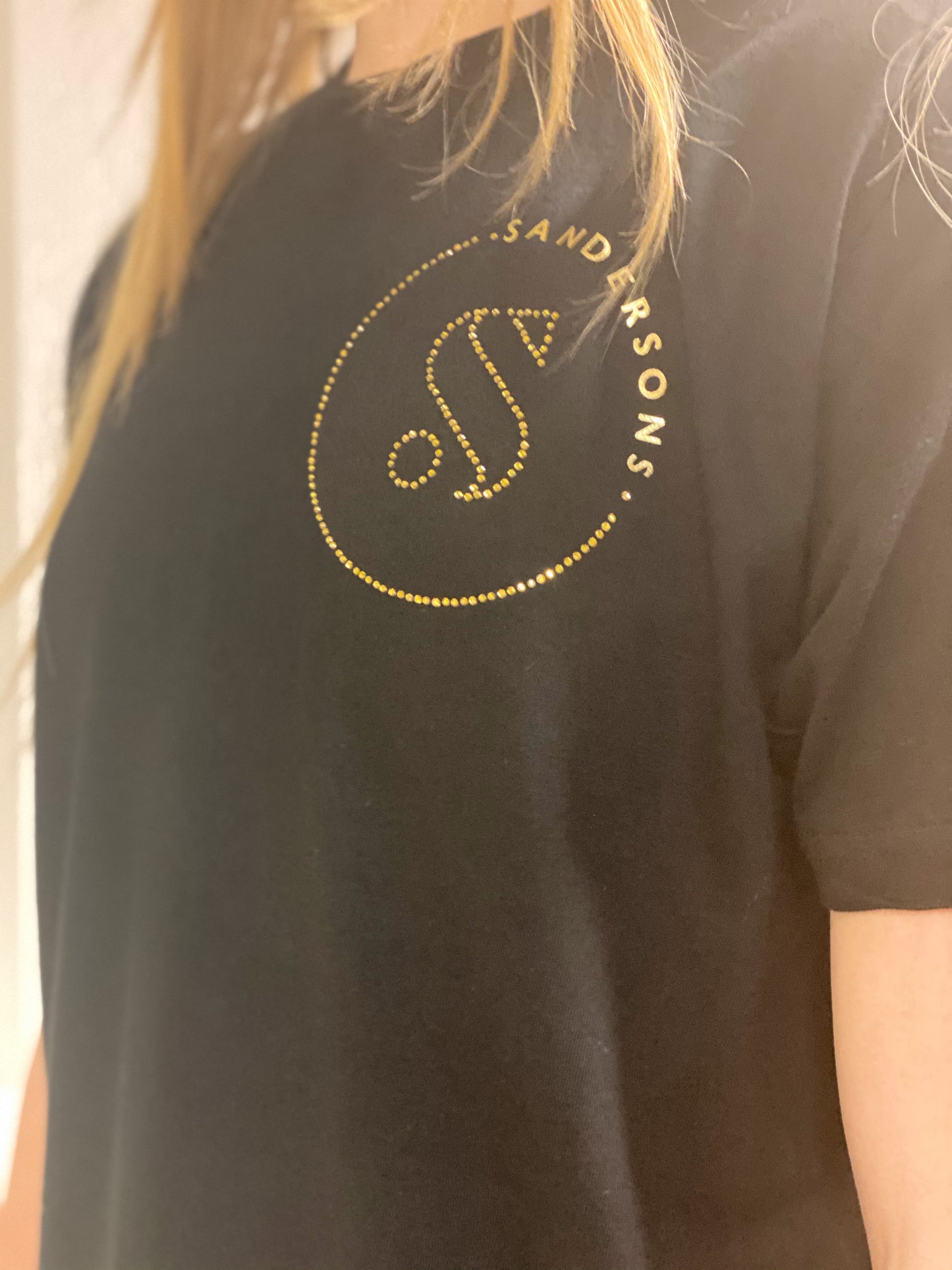 T SHIRT ADULT BLACK SANDERSONS BY AXZNT WITH SMALL BADGE GOLD PRINT & STONES