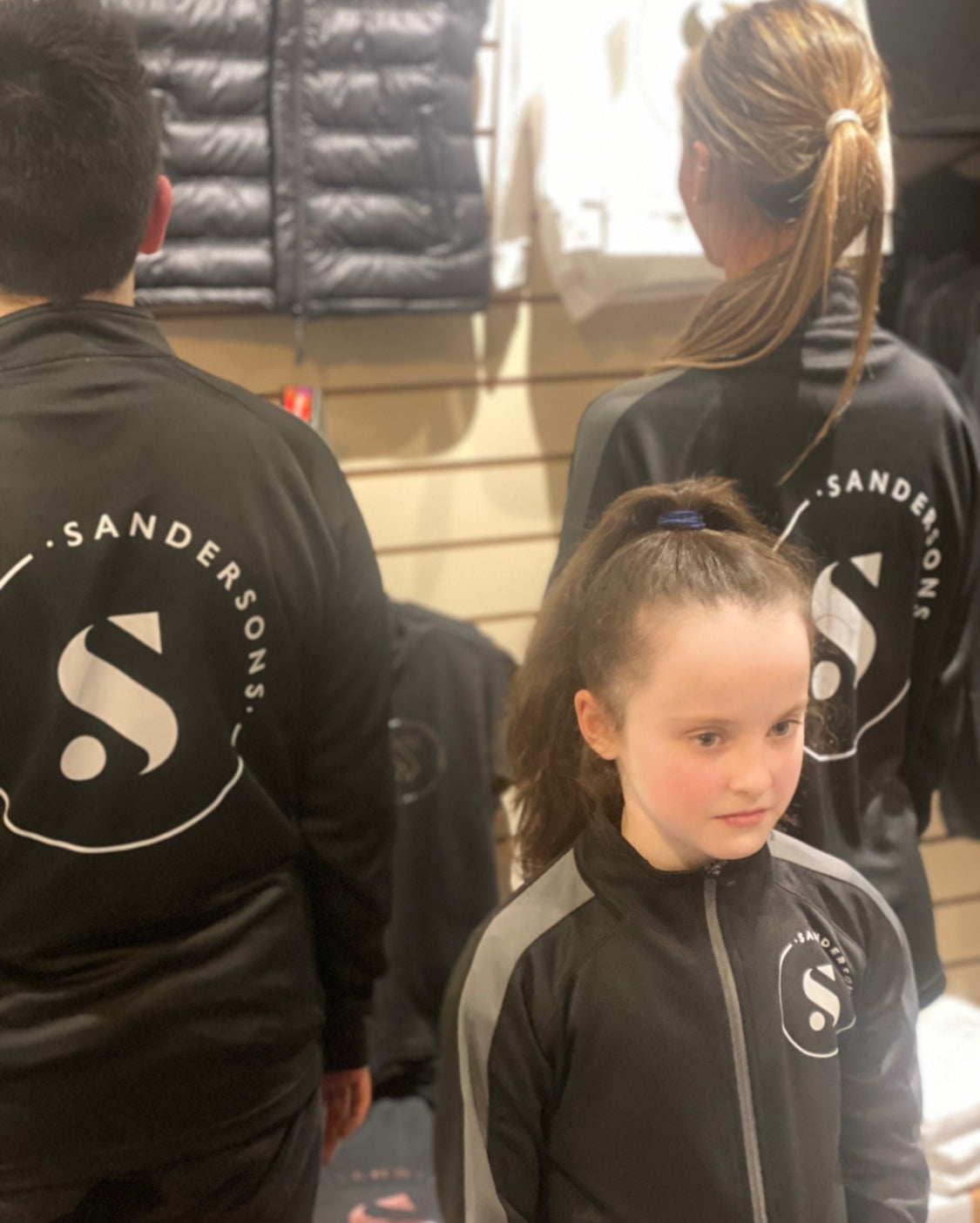 JACKET KIDS BLACK SANDERSONS SPORTS JACKET WITH GREY STRIPE WHITE LOGO ON FRONT & BACK