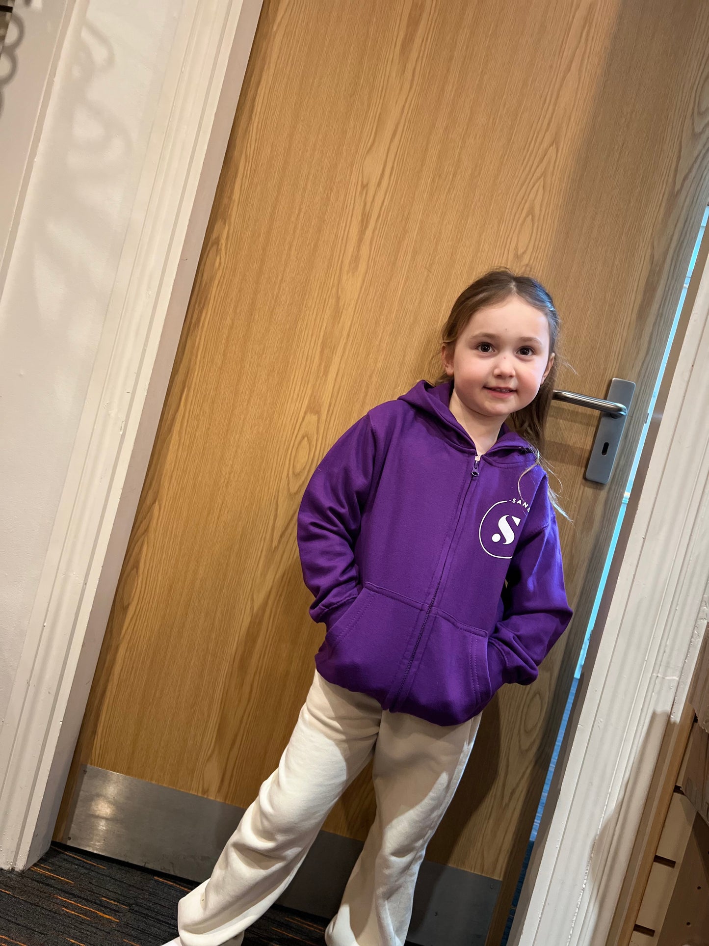 KIDS PURPLE SANDERSONS ZIP HOODIE WITH WHITE LOGO ON FRONT & BACK