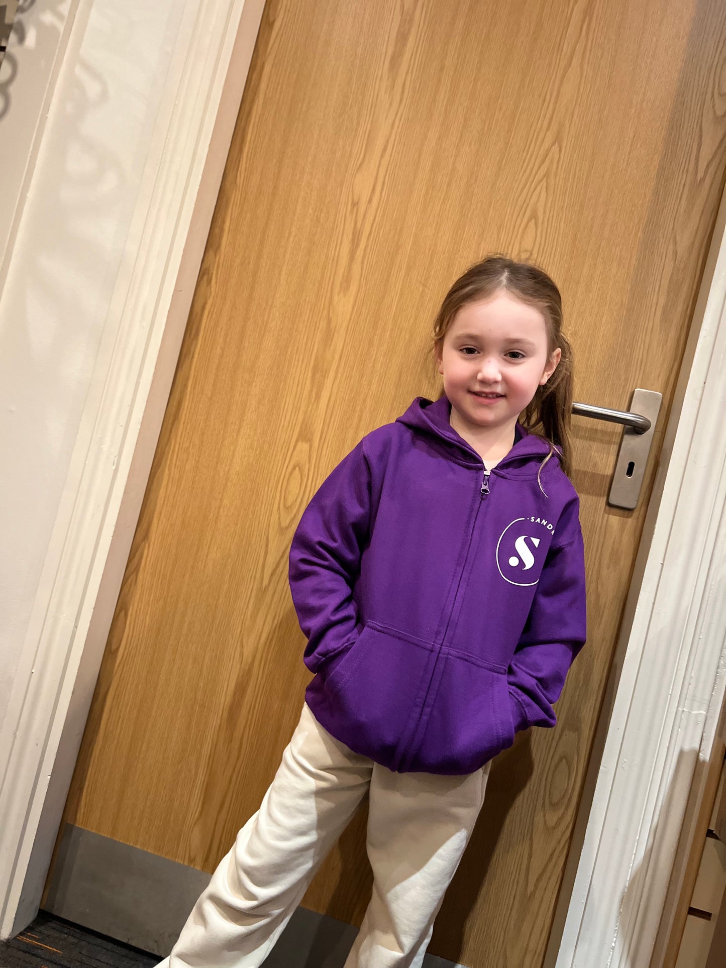 KIDS PURPLE SANDERSONS ZIP HOODIE WITH WHITE LOGO ON FRONT & BACK