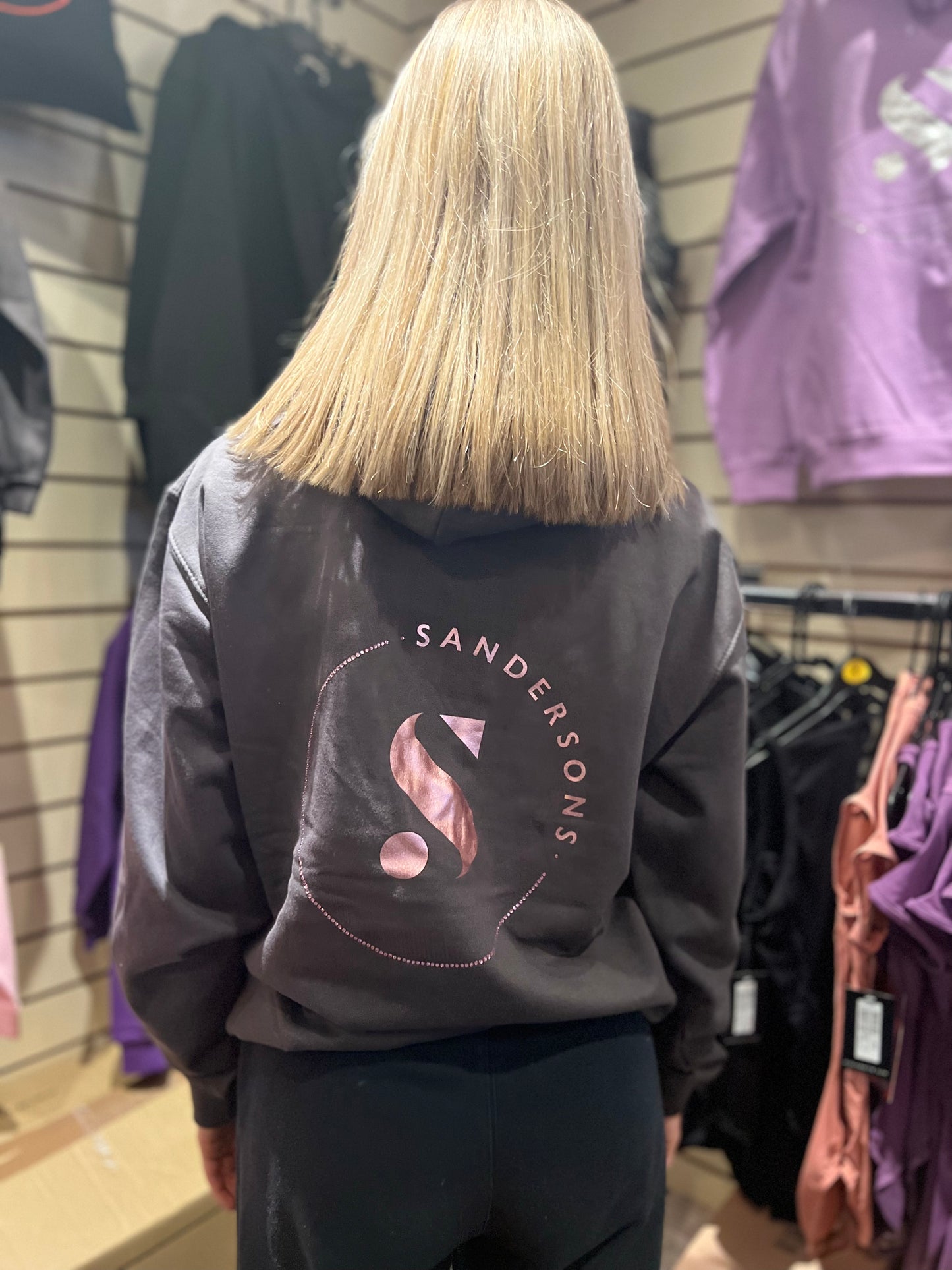 KIDS & ADULT SIZES STORM GREY SANDERSONS PULLOVER HOODIE BY AXZNT WITH METALLIC ROSE GOLD BADGE PRINT AND LARGE METALLIC ROSE GOLD PRINT & STONES